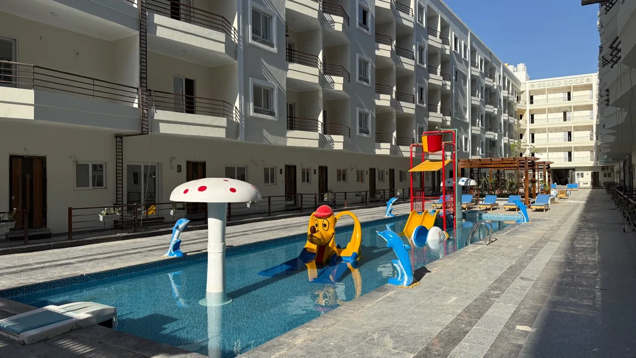 Courtyard pool and children's water-play area Courtyard pool and children's water-play area